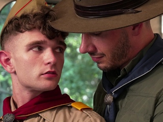 Uniformed scoutmaster barebacks twink